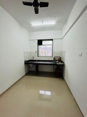 Kitchen in 1 BHK Apartment at Shri Jagdamba CHS, Wadgaon Sheri – for Rent