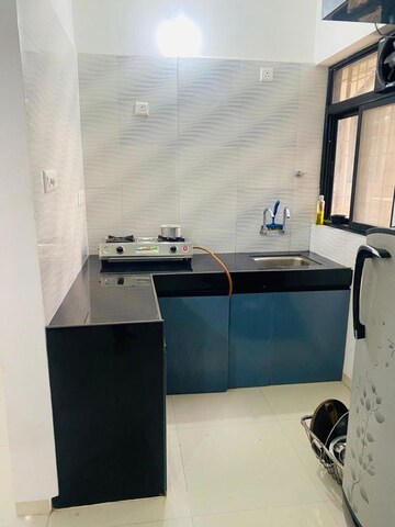 Kitchen in 1 BHK Apartment at Oxy Beaumonde, Viman Nagar – for Rent