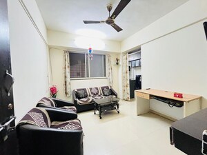 Living Room in 1 BHK Apartment at Shri Sidhant, Wadgaon Sheri – for Rent