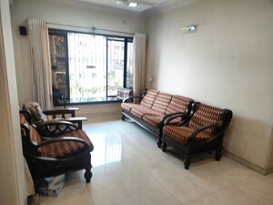Living Room in 2 BHK Apartment at Planet Powai CHS, Powai – for Rent