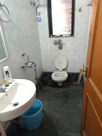 Bathroom in 3 BHK Apartment at Magnolia Enclave, Powai – for Rent