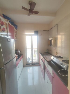 Kitchen in 1 BHK Apartment at Puranik Aarambh, Ghodbunder Road – for Sale