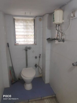 Bathroom in 2 BHK Apartment at Rehmat Tower, Santacruz East – for Rent