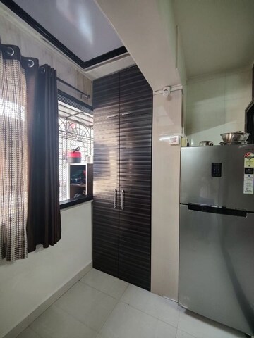 Kitchen in 1 BHK Apartment at Sanghvi Hills, Ghodbunder Road – for Rent