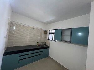 Kitchen in 2 BHK Apartment at Gurukrupa Astter, Wadgaon Sheri – for Rent