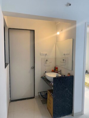 Bathroom in 3 BHK Apartment at Rohan Madhuban, Bavdhan – for Rent