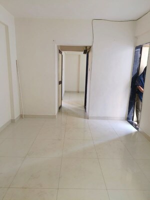 Building Lobby in 1 BHK Apartment at Wadgaon Sheri – for Rent