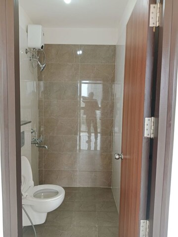 Bathroom in 1 BHK Apartment at Duville Riverdale Suites, Kharadi – for Rent