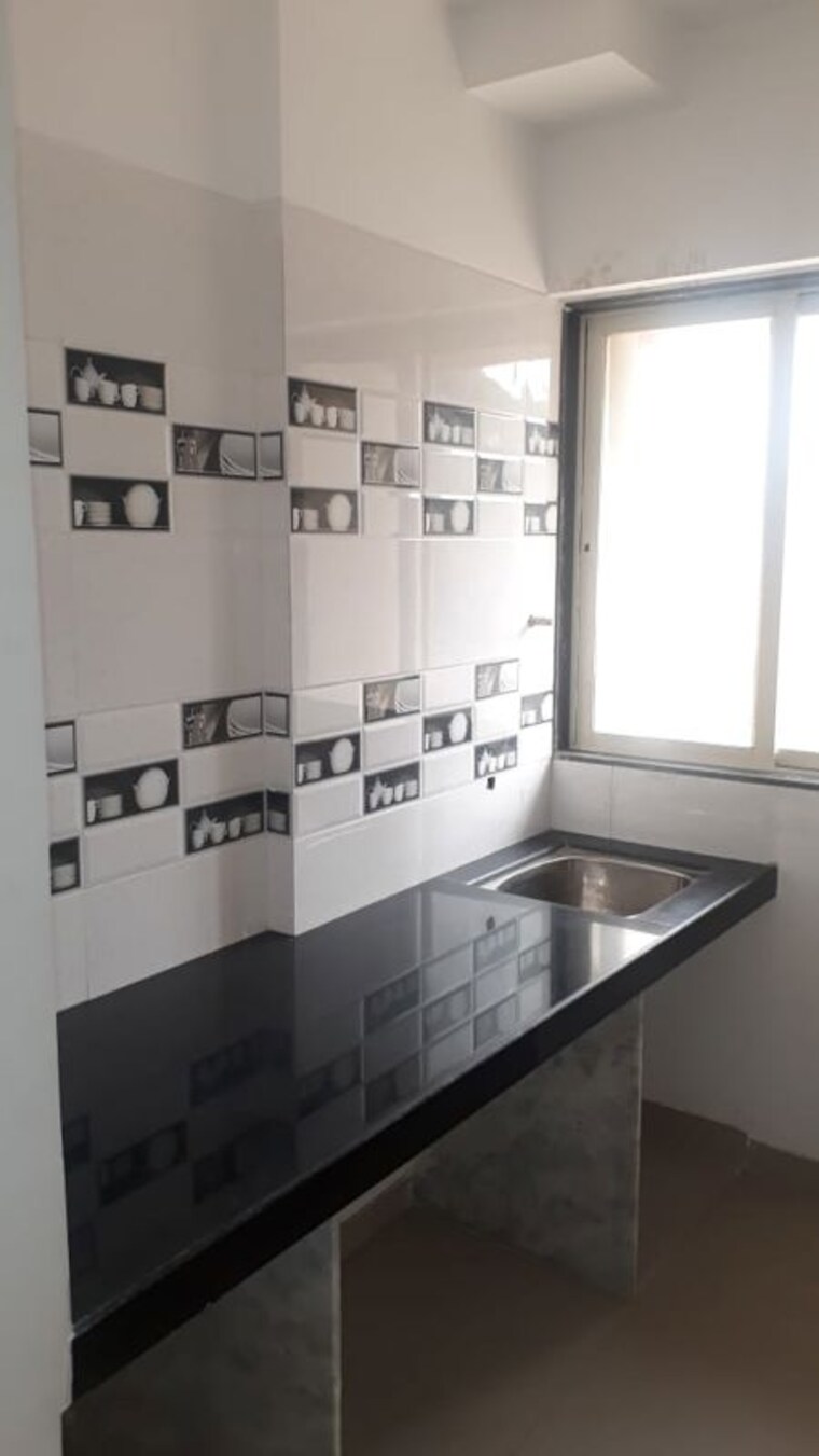 Kitchen, mansarovar-residency 1 Bedroom 393 Sq.Ft. Apartment In Desai Village Thane 9723250