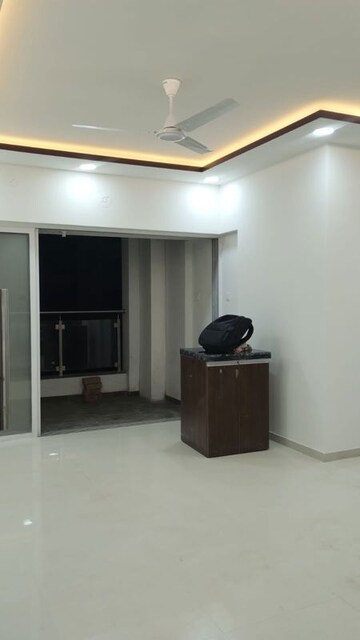 Living Room in 1 BHK Apartment at Wadgaon Sheri – for Sale