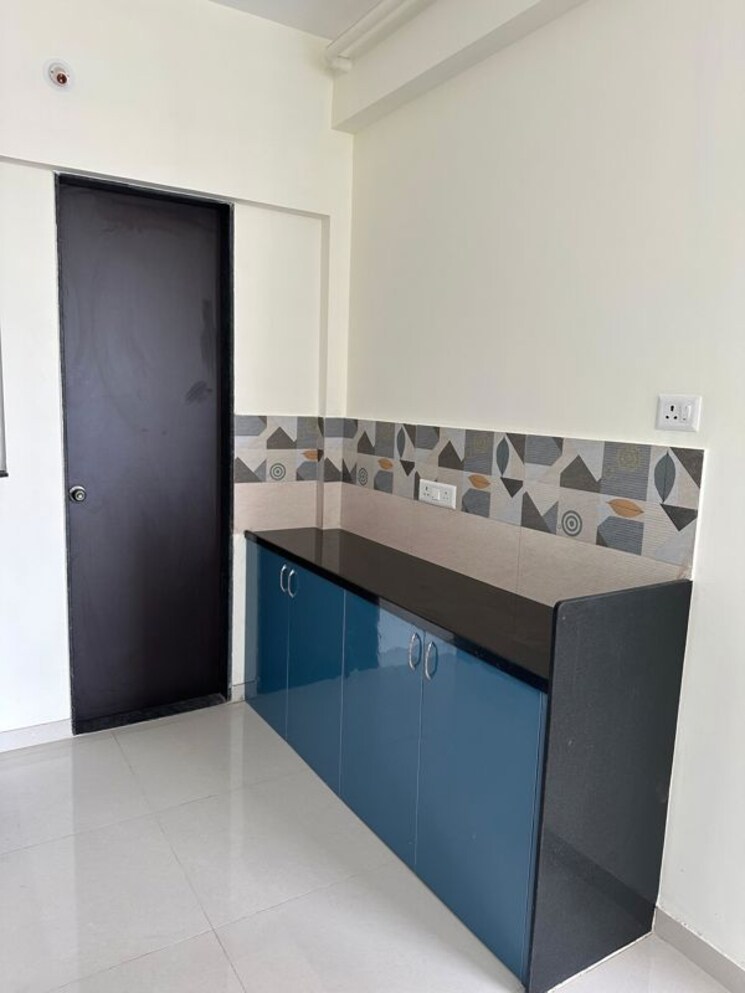 Kitchen, kolte-patil-life-republic-sec-r7-7th-avenue-i 2 Bedroom 950 Sq.Ft. Apartment In Hinjewadi Pune 9723377