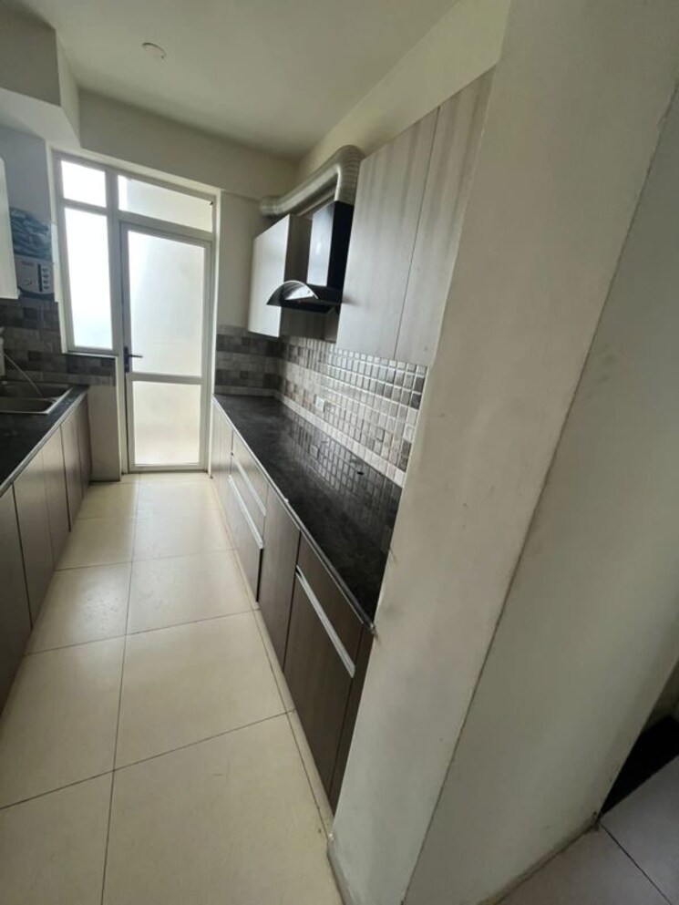 Kitchen, international airport road 2 Bedroom 900 Sq.Ft. Apartment In International Airport Road Zirakpur 9723441