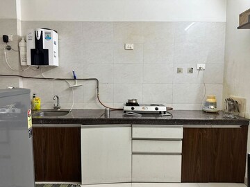 Kitchen in 2 BHK Apartment at Duville Riverdale Heights, Kharadi – for Rent