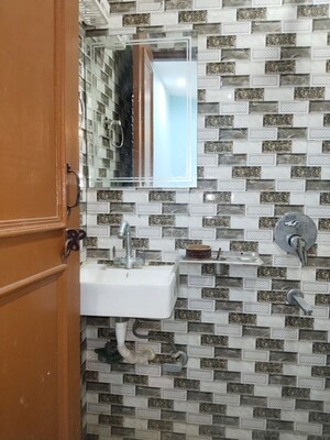 Bathroom in 2 BHK Apartment at Khirki Extension – for Rent