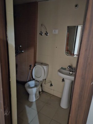 Bathroom in 2.5 BHK Apartment at Mahagun Mywoods, Sector 16c Greater Noida – for Rent
