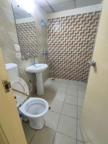 Bathroom in 2.5 BHK Apartment at Mahagun Mywoods, Sector 16c Greater Noida – for Rent