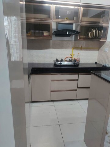 Kitchen in 2.5 BHK Apartment at Mahagun Mywoods, Sector 16c Greater Noida – for Rent