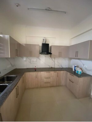 Kitchen in 3 BHK Apartment at Affinity Greens, International Airport Road – for Rent