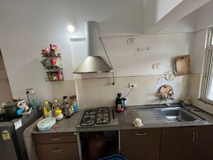 Kitchen in 2 BHK Apartment at Gera Park View, Kharadi – for Rent