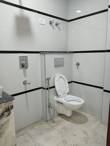 Bathroom in 4 BHK Apartment at Panchsheel Vihar – for Sale