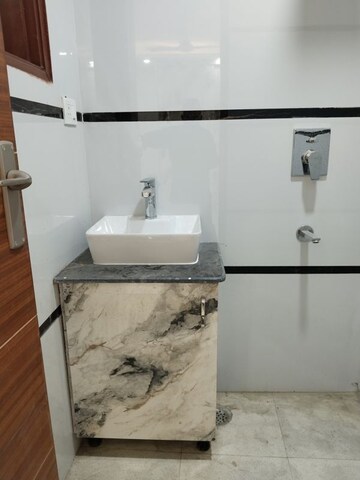 Bathroom in 4 BHK Apartment at Panchsheel Vihar – for Sale