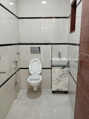 Bathroom in 4 BHK Apartment at Panchsheel Vihar – for Sale