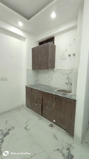 Kitchen in 1 RK Builder Floor at Paryavaran Complex – for Rent
