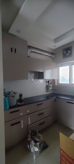 Kitchen in 3 BHK Apartment at Ansal Crown Heights, Sector 80 – for Rent