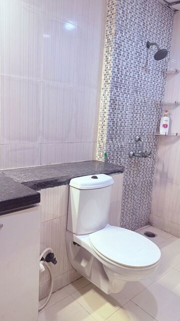 Bathroom in 3 BHK Apartment at Mahagun Mirabella, Sector 79 – for Rent