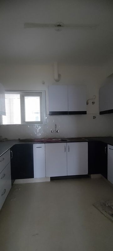 Kitchen in 3 BHK Apartment at Ansal Crown Heights, Sector 80 – for Rent