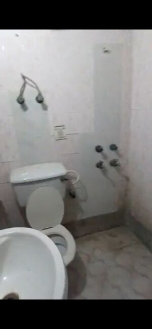 Bathroom in 2 BHK Apartment at Purvanchal PMO Apartments, Sector 62 – for Rent