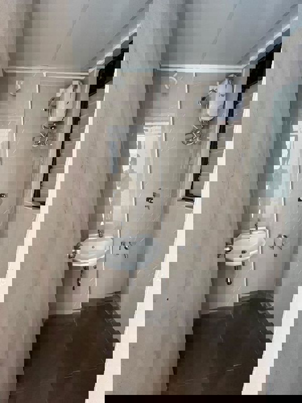 Bathroom in 1 BHK Apartment at Lodha Palava Downtown, Dombivli East – for Sale