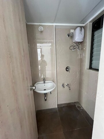Bathroom in 1 BHK Apartment at Lodha Palava Downtown, Dombivli East – for Rent