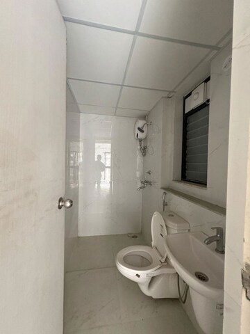 Bathroom in 2 BHK Apartment at Runwal Gardens, Dombivli East – for Rent
