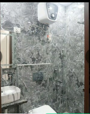 Bathroom in 2.5 BHK Builder Floor at Mansarover Garden – for Rent