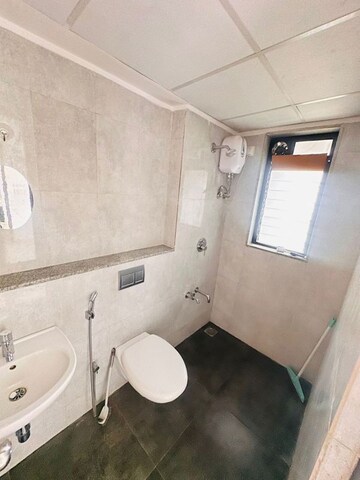 Bathroom in 2 BHK Apartment at Lodha Lakeshore Greens, Dombivli East – for Rent