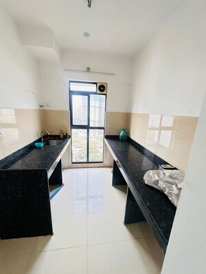 Kitchen in 2 BHK Apartment at Lodha Lakeshore Greens, Dombivli East – for Rent
