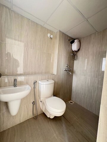 Bathroom in 2 BHK Apartment at Runwal Gardens Phase I, Dombivli East – for Rent