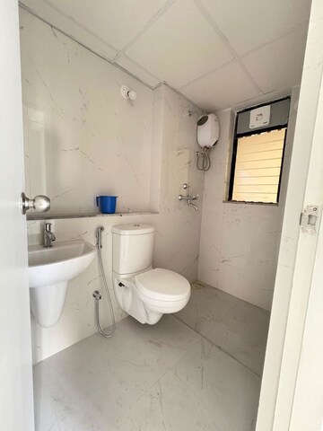 Bathroom in 2 BHK Apartment at Runwal Gardens Phase I, Dombivli East – for Rent