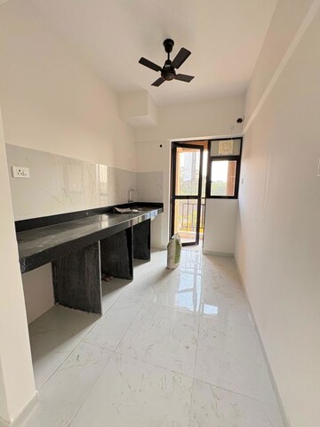 Kitchen in 2 BHK Apartment at Runwal Gardens Phase I, Dombivli East – for Rent