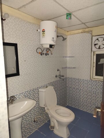 Master Bedroom in 2 BHK Apartment at Aims Golf City, Sector 75 – for Rent