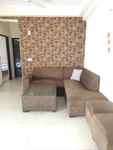 Living Room in 2 BHK Apartment at Aims Golf City, Sector 75 – for Rent