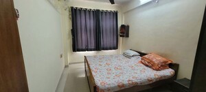 Bedroom in 3 BHK Apartment at Evershine Millenium Paradise, Kandivali East – for Rent