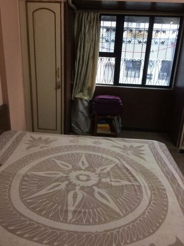 Bedroom in 3 BHK Apartment at Dheeraj Darshan, Jogeshwari East – for Rent