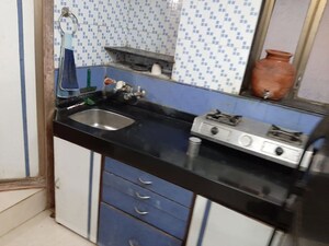 Kitchen in 1 BHK Apartment at Aruna Residency, Malad West – for Sale