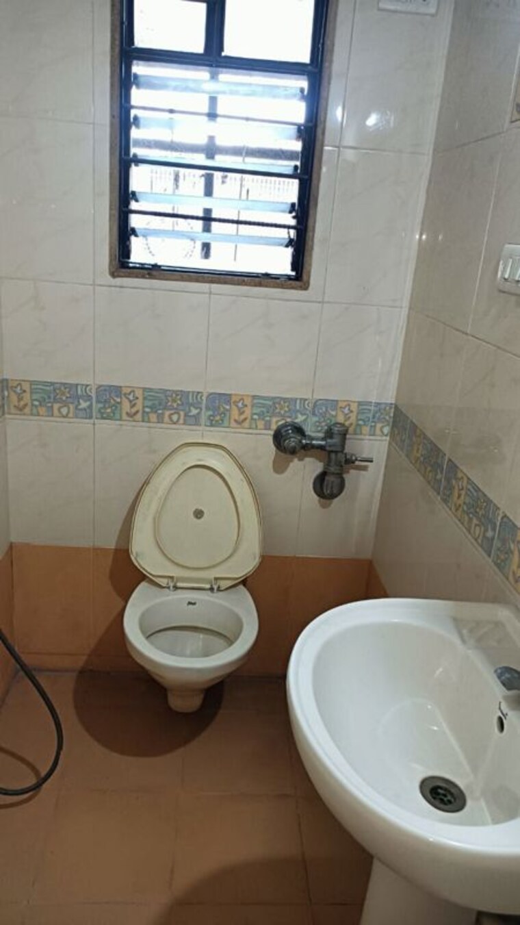 Bathroom, magarpatta-city-cosmos 2 Bedroom 980 Sq.Ft. Apartment In Magarpatta Road Pune 9724268