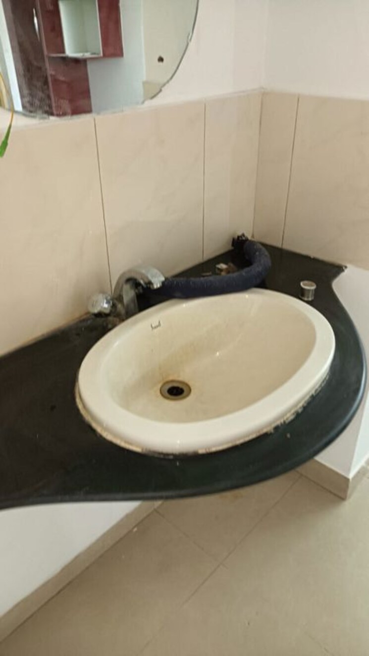 Bathroom, magarpatta-city-cosmos 2 Bedroom 980 Sq.Ft. Apartment In Magarpatta Road Pune 9724268