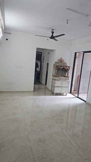 Living Room in 1 BHK Apartment at Lodha Palava Downtown, Dombivli East – for Sale