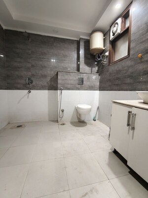 Bathroom in 4 BHK Builder Floor at Chattarpur – for Rent