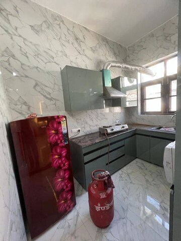 Kitchen in 3 BHK Builder Floor at Dhakoli – for Sale